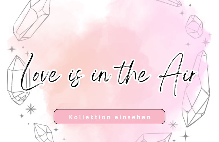 Text mit „Love is in the Air“ auf pastellfarbigem Hintergrund mit Kristallen.
